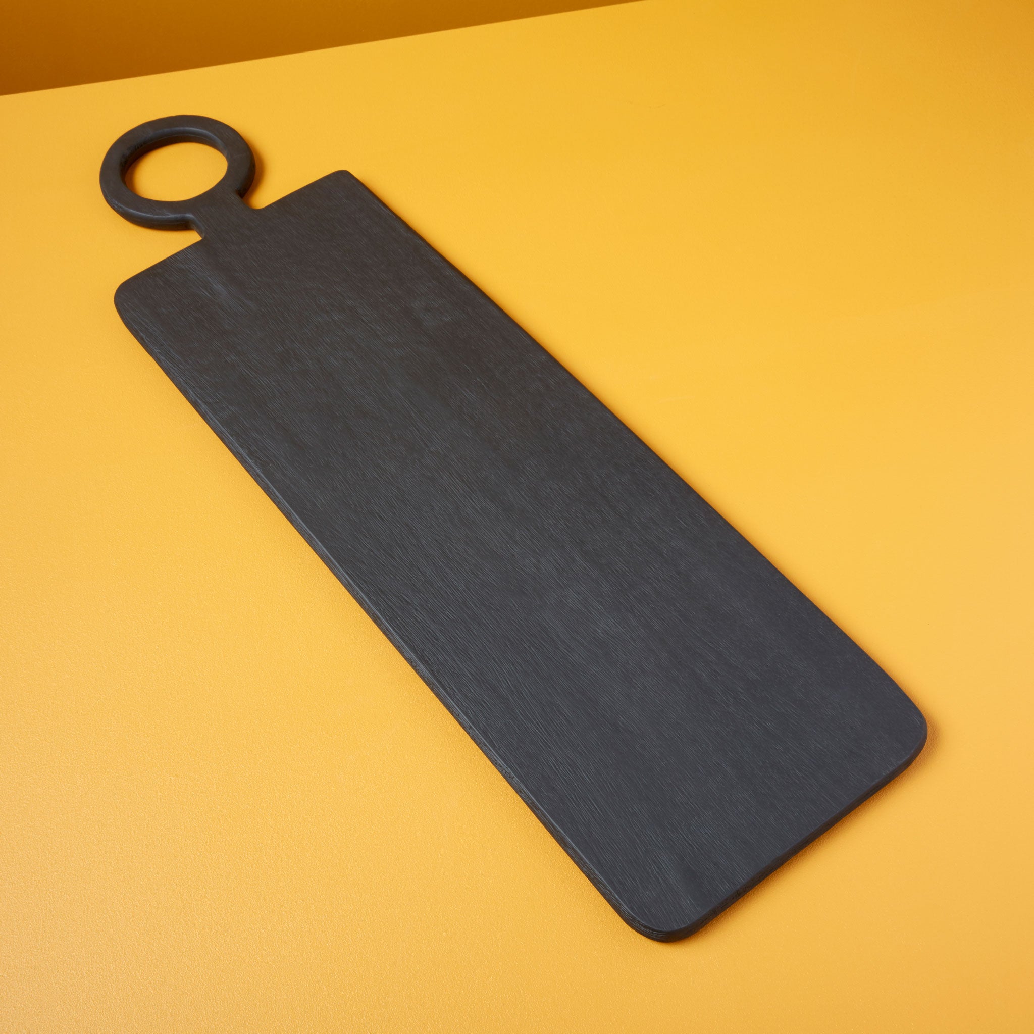 Planche rectangulaire en bois de manguier noir